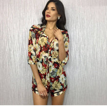 Red flowery playsuit
